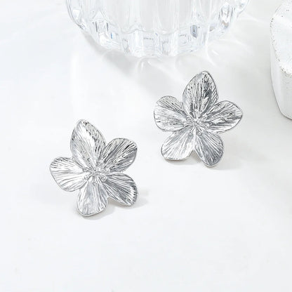 PENDIENTES Y ANILLOS  DISEÑO FLORAL