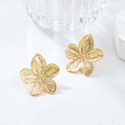 PENDIENTES Y ANILLOS  DISEÑO FLORAL